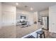 Modern kitchen features stainless steel appliances, granite counters and an island with bar seating at 4234 Lunar Canyon Ave, North Las Vegas, NV 89084