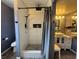 Beautiful bathroom featuring a walk-in shower with decorative tile work and modern fixtures at 4262 Tarkin Ave, Las Vegas, NV 89120