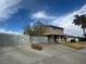 Two story home with a large driveway and two car garage at 4262 Tarkin Ave, Las Vegas, NV 89120