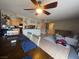 Open concept kitchen, dining, and living areas at 4262 Tarkin Ave, Las Vegas, NV 89120