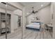 Bright bedroom with modern lighting, ensuite bath and walk in closet at 4689 Kristen Ln, Las Vegas, NV 89121