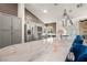 Modern kitchen boasts stainless steel appliances, spacious island with bar seating, and sleek finishes at 4689 Kristen Ln, Las Vegas, NV 89121