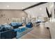 Spacious open floor plan with vaulted ceiling, modern decor, and seamless flow to kitchen at 4689 Kristen Ln, Las Vegas, NV 89121