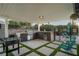 Beautiful outdoor kitchen with built-in grill, mini-fridge, and a view of the inviting pool at 4689 Kristen Ln, Las Vegas, NV 89121