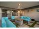 Cozy covered patio with modern seating and a fire pit for relaxing outdoor entertainment at 4689 Kristen Ln, Las Vegas, NV 89121