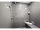 Modern tiled shower includes a bench, rain shower head and multiple sprayers at 4689 Kristen Ln, Las Vegas, NV 89121