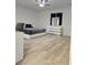 This primary bedroom boasts a ceiling fan, ensuite bath and a large window for natural light at 5051 Fairmont St, Pahrump, NV 89061