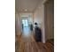 Elegant entryway with wood-look flooring, neutral paint and a stylish wood cabinet at 5051 Fairmont St, Pahrump, NV 89061