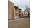 Exterior view of a multi-story apartment complex with stairs and landscaping at 519 Fir St # G, Boulder City, NV 89005