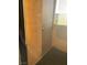 The porch has black carpet and brown stucco walls at 519 Fir St # G, Boulder City, NV 89005