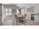 Bright dining area with decorative shelving, lots of light, and seating for six at 5429 Painted Sunrise Dr, Las Vegas, NV 89149