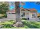 Charming single-story home with a well-maintained front yard, mature landscaping, and a two-car garage at 5429 Painted Sunrise Dr, Las Vegas, NV 89149