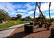 Picturesque community park with walking paths, lush landscaping, and recreational areas at 5457 Jackpot Winner Ln # 101, Las Vegas, NV 89122