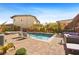 Resort-style pool and spa with lush landscaping and plenty of room for outdoor entertaining at 5523 Kyle Peak Ct, Las Vegas, NV 89135