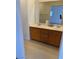 Bathroom with a double vanity sink offering ample counter and storage space at 5564 Ness Ave, Las Vegas, NV 89118