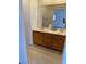 Bathroom with a double vanity sink offering ample counter and storage space at 5564 Ness Ave, Las Vegas, NV 89118