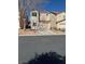 Two-story home featuring a attached two-car garage and low maintenance landscaping at 5564 Ness Ave, Las Vegas, NV 89118