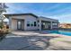Modern home with pool and desert landscaping in the backyard at 6130 Pebble Glen, Las Vegas, NV 89149