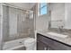 Modern bathroom featuring a glass-enclosed shower and granite countertop at 6130 Pebble Glen, Las Vegas, NV 89149