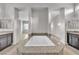 Beautiful bathroom featuring a soaking tub in the center, dual sinks and granite countertops at 6130 Pebble Glen, Las Vegas, NV 89149