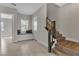 Hallway featuring staircase with wood treads, a window seat and natural light at 6130 Pebble Glen, Las Vegas, NV 89149