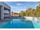 Backyard pool with a spa and well-maintained landscaping at 6130 Pebble Glen, Las Vegas, NV 89149