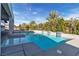 Backyard pool featuring a spa and beautiful landscaping at 6130 Pebble Glen, Las Vegas, NV 89149
