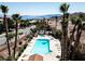 Resort-style pool and sundeck with palm trees and mountain views at 650 Sandy Beach Way # 0, Boulder City, NV 89005