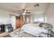 Another view of the bedroom; windows providing great natural light, ceiling fan and closet at 6736 Sugarbird Ct, North Las Vegas, NV 89084