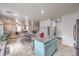 Spacious kitchen with blue island that connects to living room and has lots of storage at 6736 Sugarbird Ct, North Las Vegas, NV 89084