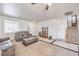 Bright and airy living room with neutral tones and an open floor plan at 6736 Sugarbird Ct, North Las Vegas, NV 89084