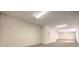 Unfinished basement featuring carpeting, ample lighting, and concrete walls at 6741 Philippe Allen Ave, Las Vegas, NV 89110
