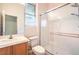 Bathroom featuring a glass shower and sink with natural light from the window at 6741 Philippe Allen Ave, Las Vegas, NV 89110