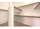 Walk-in closet featuring built-in shelving and ample storage space at 6741 Philippe Allen Ave, Las Vegas, NV 89110