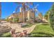 Charming home featuring a well-maintained lawn and stone pathway at 6741 Philippe Allen Ave, Las Vegas, NV 89110