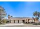 Charming single-story home featuring a 3-car garage and desert landscaping at 6741 Philippe Allen Ave, Las Vegas, NV 89110