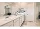 Bright bathroom with dual sinks, large mirror, and modern fixtures at 758 Marigold Sunrise St, Henderson, NV 89011