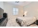 Cozy bedroom with a neutral color scheme, shutters, and a comfortable-looking bed and carpet at 758 Marigold Sunrise St, Henderson, NV 89011