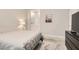 Bright bedroom featuring a plush bed, neutral colors, and modern decor at 758 Marigold Sunrise St, Henderson, NV 89011