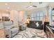 Bright and spacious living room featuring comfortable seating and open floor plan at 758 Marigold Sunrise St, Henderson, NV 89011