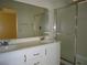 Bathroom features a double sink vanity with a large mirror and a shower/tub combo at 7929 Palace Monaco Ave, Las Vegas, NV 89117