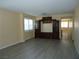 Comfortable living area with wood floors, a decorative cabinet, and ample space at 7929 Palace Monaco Ave, Las Vegas, NV 89117