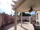 Covered patio with ceiling fan, privacy walls and paver flooring at 7929 Palace Monaco Ave, Las Vegas, NV 89117