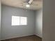 Bedroom with neutral carpet, ceiling fan and natural light from window at 8212 Calico Wind St, Las Vegas, NV 89131