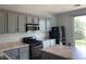 Well-maintained kitchen featuring a gas range and island prep area at 8212 Calico Wind St, Las Vegas, NV 89131