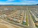 Expansive aerial view of neighborhood with street layout and scenic mountains at 9032 Skye Canyon Ranch St, Las Vegas, NV 89166