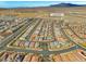 Wide aerial view of a residential area, with the street address pinpointed at 9032 Skye Canyon Ranch St, Las Vegas, NV 89166