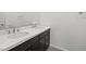 Bathroom featuring a double sink vanity with white countertops at 9032 Skye Canyon Ranch St, Las Vegas, NV 89166