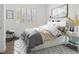 Cozy bedroom with modern decor and plenty of natural light from the window at 9032 Skye Canyon Ranch St, Las Vegas, NV 89166