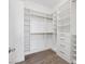 Walk-in closet featuring built-in shelves and drawers for ample storage at 9032 Skye Canyon Ranch St, Las Vegas, NV 89166